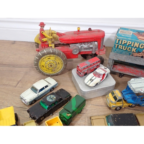 94 - A boxed Cowan de Groot Ltd battery operated Tipping Truck, battery operated Tractor, play worn dieca... 