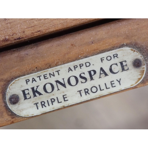 99 - A mid-century Trolley and Occasional Table with stamps, pair of Stools, Folding Table, copper topped... 