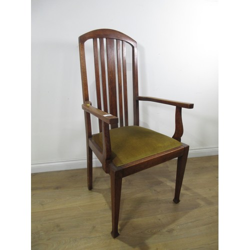 253 - An upholstered mahogany Chair, an oak Elbow Chair with squared tapering supports and two oak Dining ... 