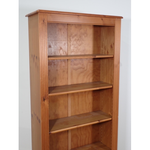 11 - A modern pine open Bookcase with adjustable shelves 5ft 11in H x 2ft 9in W