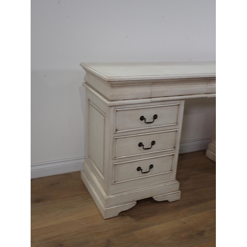 114 - A white painted Dressing Table fitted nine drawers 4ft11in W x 2ft 5in H