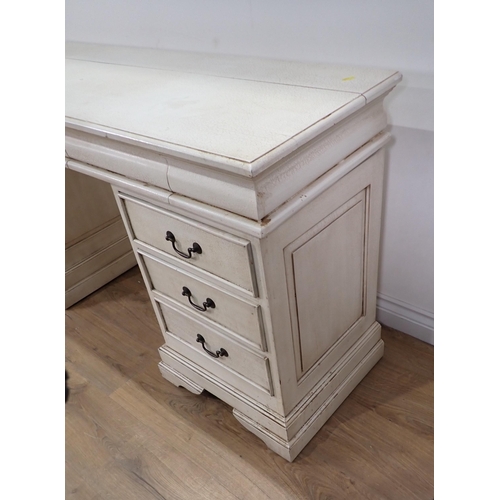 114 - A white painted Dressing Table fitted nine drawers 4ft11in W x 2ft 5in H