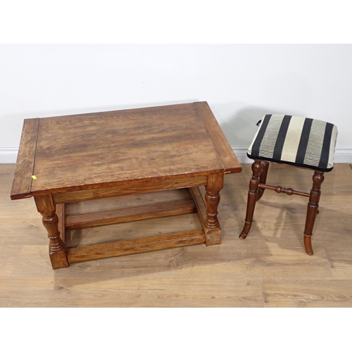 115 - An Edwardian walnut effect Stool stamped Brooks Limited and a hardwood Coffee Table