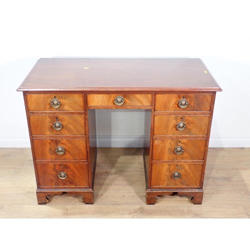 116 - A Georgian style mahogany pedestal Desk fitted nine drawers mounted on bracket feet 3ft 6in W x 2ft ... 