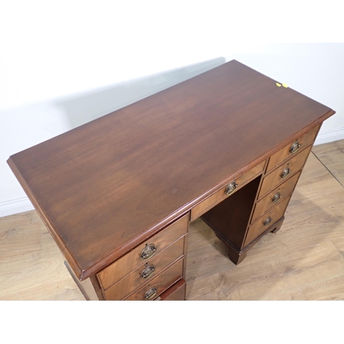 116 - A Georgian style mahogany pedestal Desk fitted nine drawers mounted on bracket feet 3ft 6in W x 2ft ... 