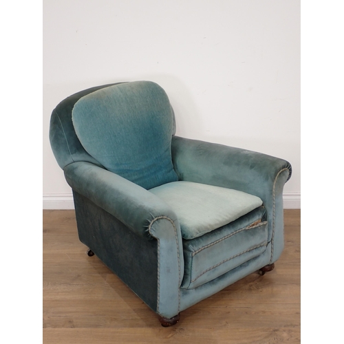 119 - An antique blue upholstered Armchair