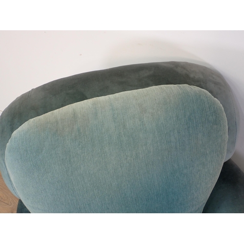 119 - An antique blue upholstered Armchair