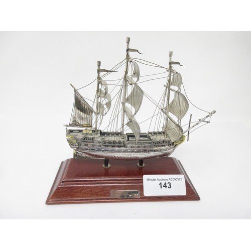 143 - A Model of HMS Victory, sails marked 925, with original receipt for £277 in 1993, a silver plated Mu... 