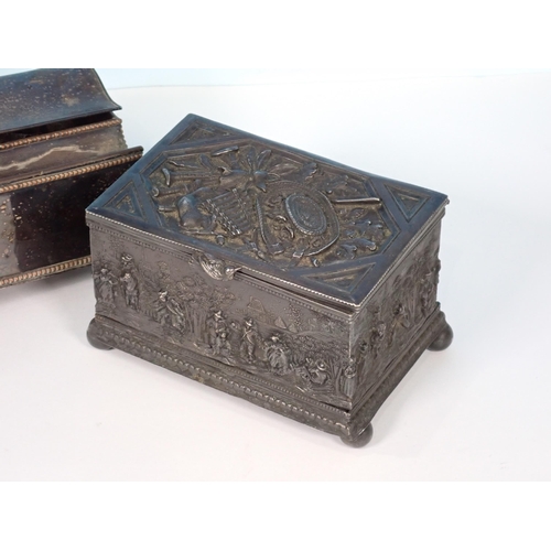 206 - A silver plated Inkstand, one foot detached and a Continental embossed metal Jewel Box with frieze o... 