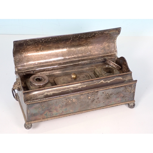 206 - A silver plated Inkstand, one foot detached and a Continental embossed metal Jewel Box with frieze o... 