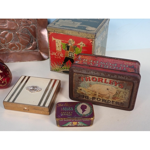 221 - An Art and Crafts small copper oblong Tray, a Thorley's Pig Powder Tin, various other Tins and two R... 