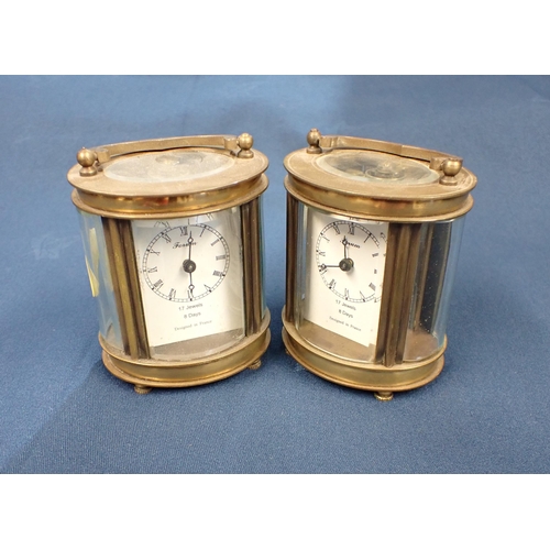 224 - A pair of small oval brass Carriage Clocks by Forum, 3 1/4in high