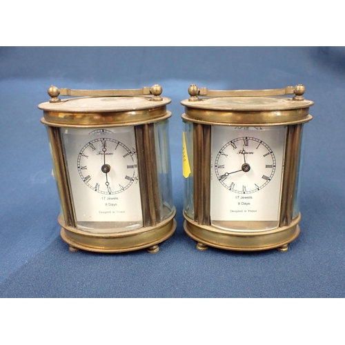 224 - A pair of small oval brass Carriage Clocks by Forum, 3 1/4in high