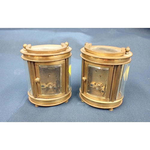 224 - A pair of small oval brass Carriage Clocks by Forum, 3 1/4in high