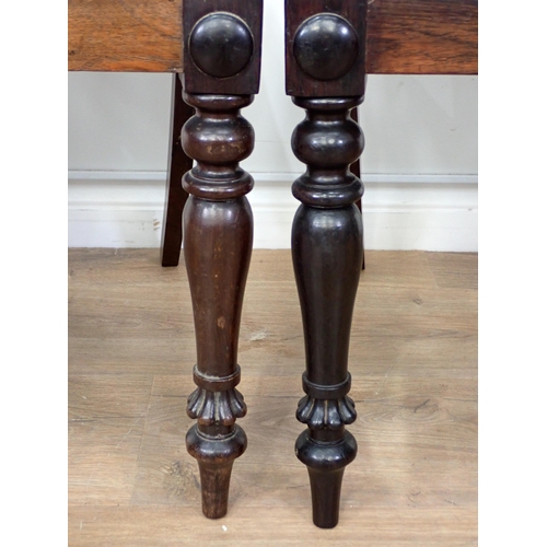 235 - A set of four Victorian rosewood Dining Chairs