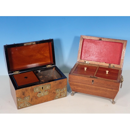 33 - A 19th Century rosewood two division Tea Caddy with lion mask brass ring handles on paw feet and a V... 