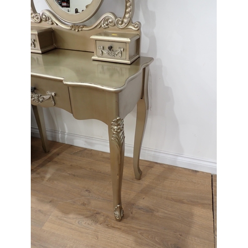 34 - A modern gold painted Dressing Table and a metal covered bombe Chest of drawers