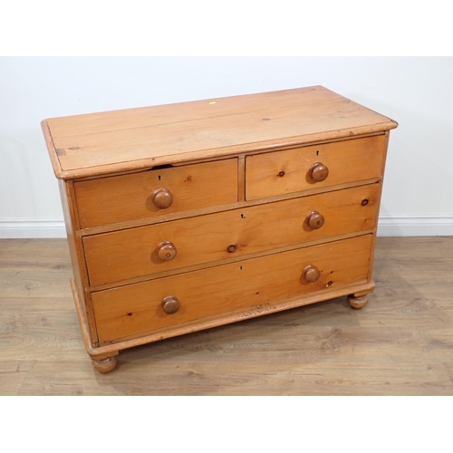 46 - A Victorian pine Chest of two short and two long drawers raised on bun feet 3ft 6in W x 2ft 5in H