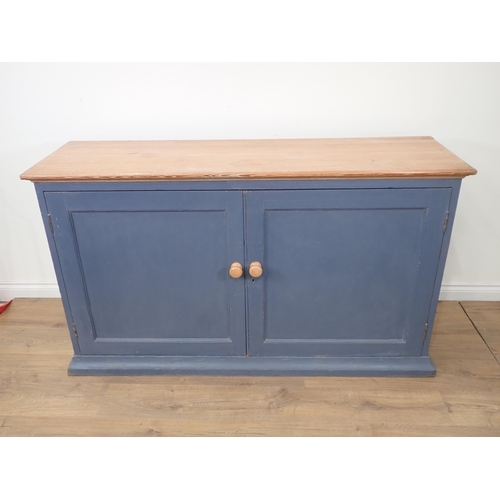 47 - A scrub top pine blue painted two door Cupboard enclosing fixed shelves 5ft 2in W x 3ft H