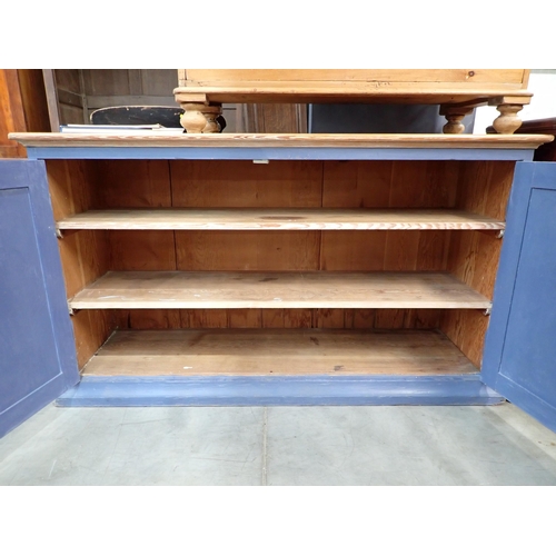 47 - A scrub top pine blue painted two door Cupboard enclosing fixed shelves 5ft 2in W x 3ft H