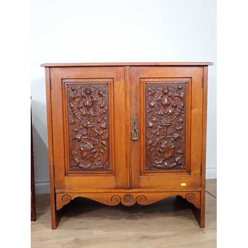 71 - A Victoria walnut Cupboard fitted pair of carved doors (back cut out) 2ft 11in H x 2ft 10in W and a ... 