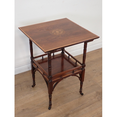 81 - A Victorian rosewood and inlaid two tier Occasional Table on ring turned supports 2ft 2in H x 1ft 8i... 