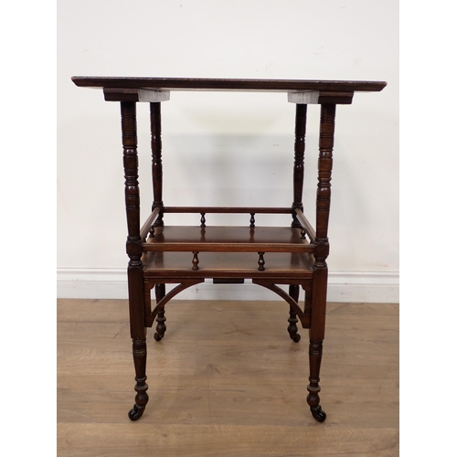 81 - A Victorian rosewood and inlaid two tier Occasional Table on ring turned supports 2ft 2in H x 1ft 8i... 