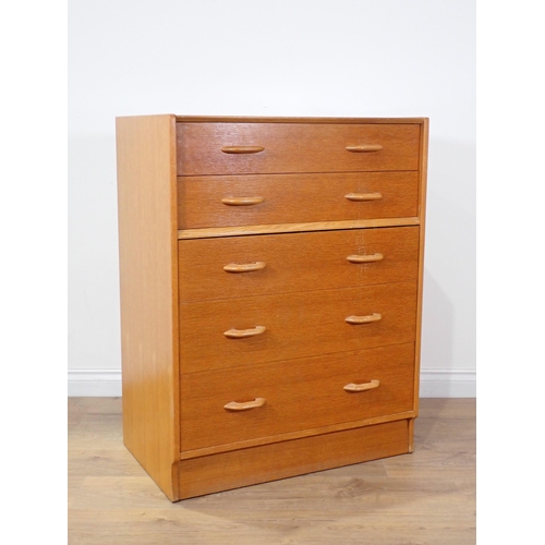 87 - A moulded oak Bureau and a modern oak veneered Chest of five drawers