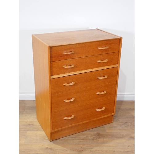 87 - A moulded oak Bureau and a modern oak veneered Chest of five drawers