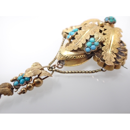 148 - A Victorian Turquoise Brooch formed as acanthus leaves with clusters of turquoise, approx 8cms top t... 