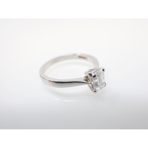 149 - A Diamond single stone Ring corner claw-set emerald-cut stone, 0.79cts, in platinum, ring size L 1/2... 