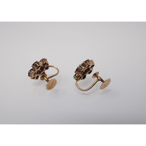 163 - A pair of Flower Cluster Earrings each claw-set brilliant-cut diamond within a frame of six round bl... 