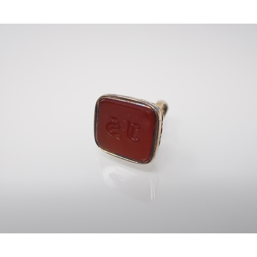 176 - A gold Seal Fob set carnelian engraved initials in original box.