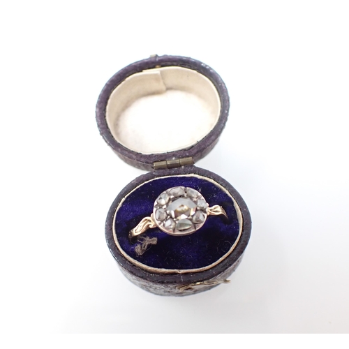 186 - A Georgian Diamond Cluster Ring close-set rose-cut stones, shank engraved, ring size J 1/2