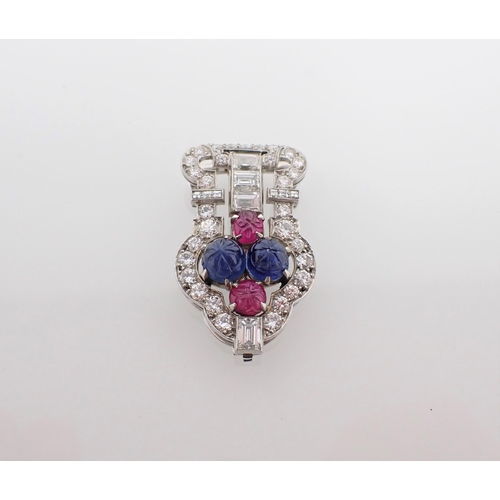 196 - A 1930's gem-set 'Tutti Frutti' Clip claw-set two carved sapphire cabochons, two carved ruby cabocho... 