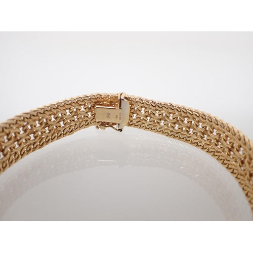 206 - A 9ct gold fancy link Bracelet, 18.50cms long, approx 21.80gms