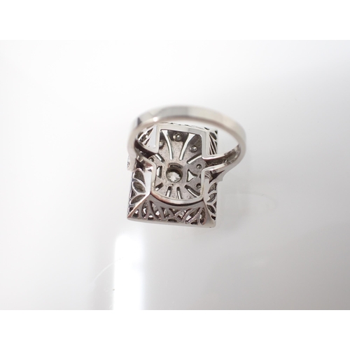 211 - An Art Deco style Cocktail Ring the rectangular openwork plaque millegrain-set principle old-cut sto... 