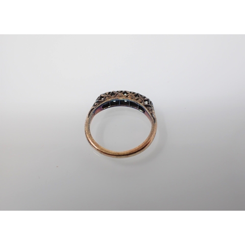 215 - A Diamond five stone Ring pavé-set graduated old-cut stones stamped 18, ring size I 1/2.