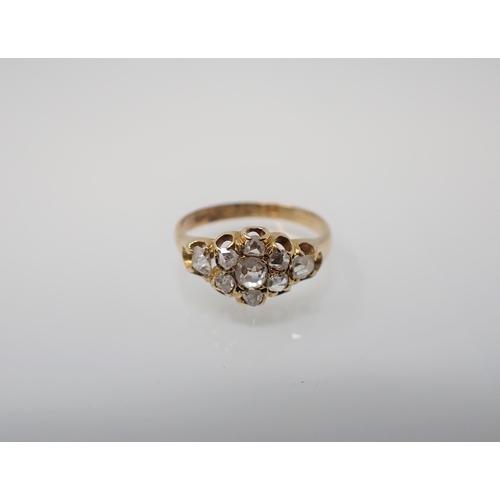 217 - A Victorian Diamond Cluster Ring pavé-set cushion and rose-cut stones in 18ct gold, ring size I.