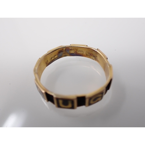 218 - An 18ct gold memoriam Ring  having black enamel panels spelling 'DAUGHTER' interspersed with panels ... 