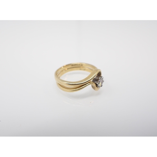 219 - A Diamond single stone Ring claw-set brilliant-cut stone, estimated 0.20cts, on shaped 18ct gold sha... 