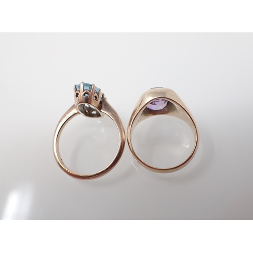 221 - An Aquamarine Ring claw-set single oval-cut stone, stamped 9ct, ring size M and an Amethyst Ring set... 