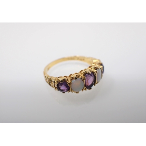 239 - An Amethyst and Opal five stone Ring claw-set oval-cut amethyst between two oval opals and two round... 