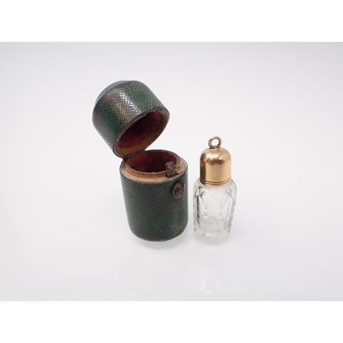 262 - A miniature cut glass Scent Bottle with gold screw top in shagreen case, case 33mm high