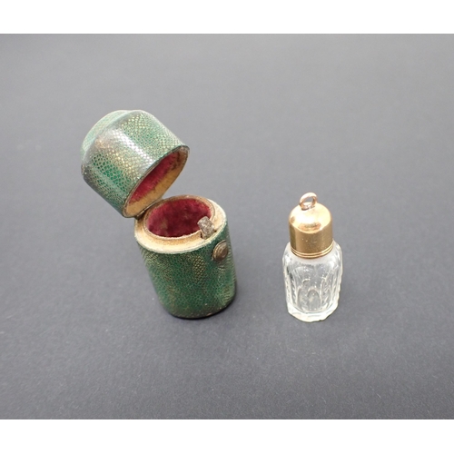 262 - A miniature cut glass Scent Bottle with gold screw top in shagreen case, case 33mm high