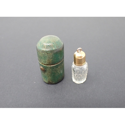 262 - A miniature cut glass Scent Bottle with gold screw top in shagreen case, case 33mm high