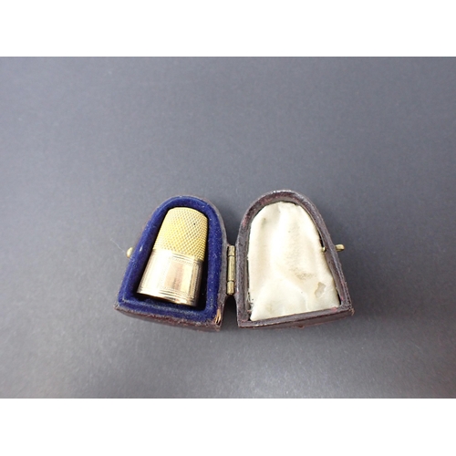 263 - A gold Thimble in leather case, unmarked, approx 3.10gms