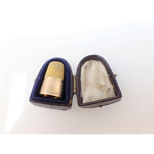 263 - A gold Thimble in leather case, unmarked, approx 3.10gms