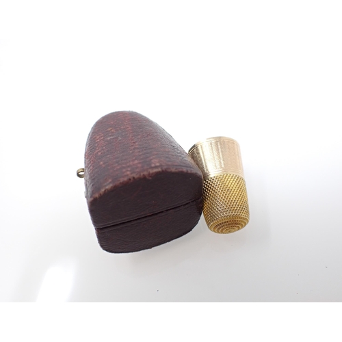 263 - A gold Thimble in leather case, unmarked, approx 3.10gms