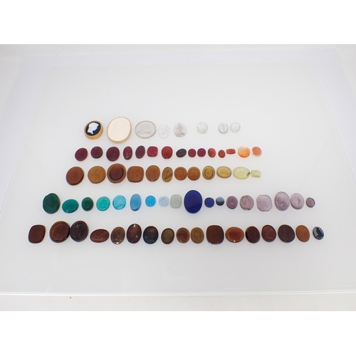 265 - A Collection of approx sixty eight 19th Century Tassie glass Gem Cameos of classical busts and figur... 